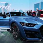 Media members with Ford Mustang Shelby GT500 at the North American International Auto Show in Detroit, Michigan