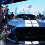 Media members with Ford Mustang Shelby GT500 at the North American International Auto Show in Detroit, Michigan