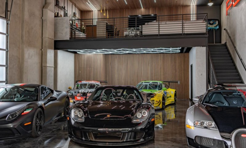 Porsche race cars in a member's car condo at the Finish Line Auto Club Costa Mesa facility.