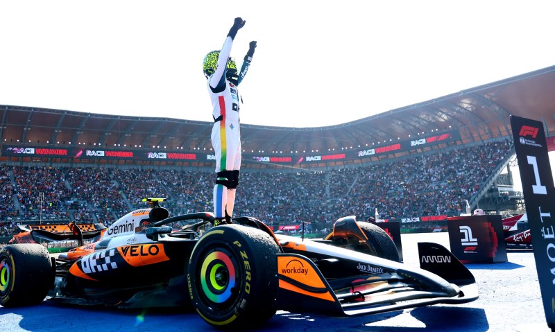 Lando Norris greets the crowd after winning the Mexico City Grand Prix.