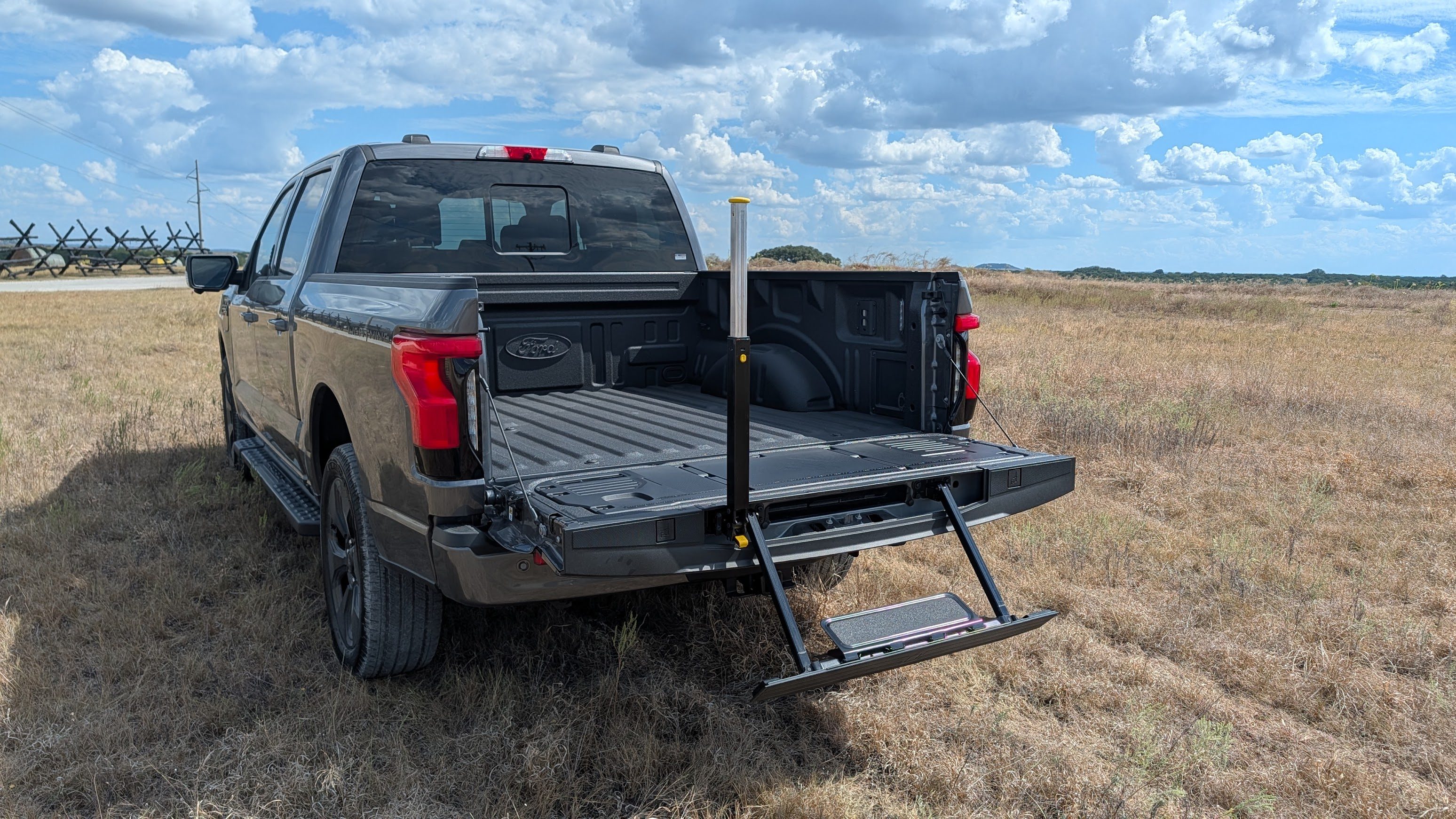 Ford F-150 lightning with its tailgate down