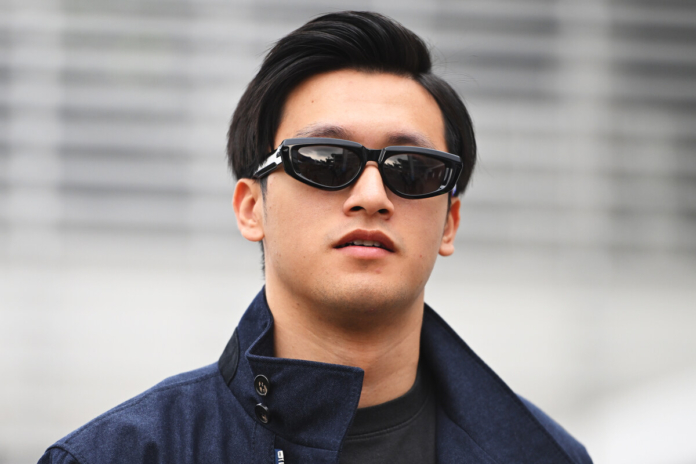 Official, Zhou in the Cadillac as a reserve driver
