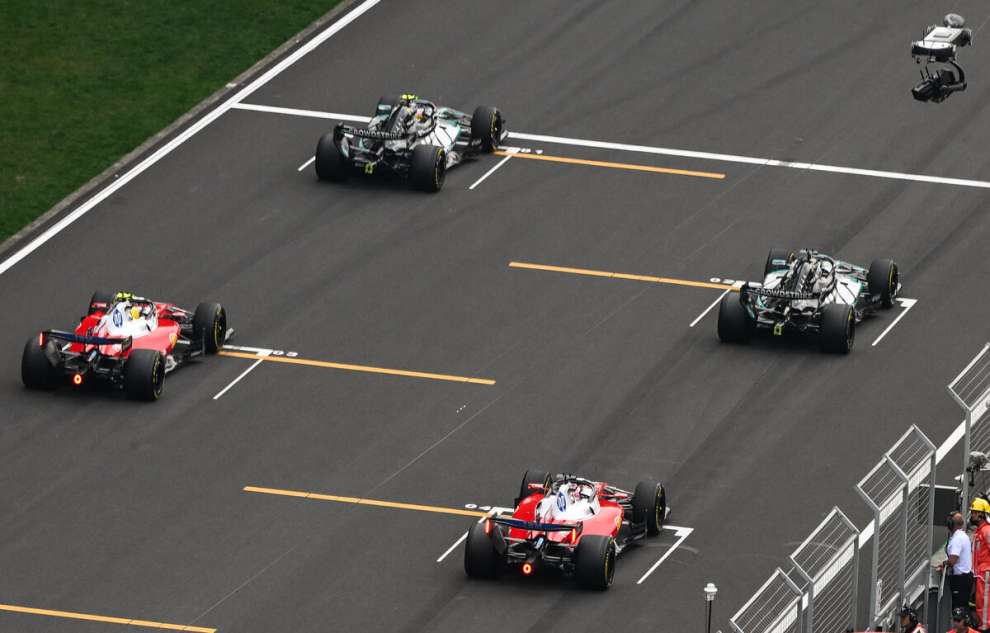 Mercedes and Ferrari at the start in China